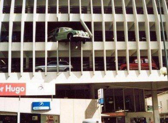 car-crashes-out-of-second-floor-parking-garage.jpg